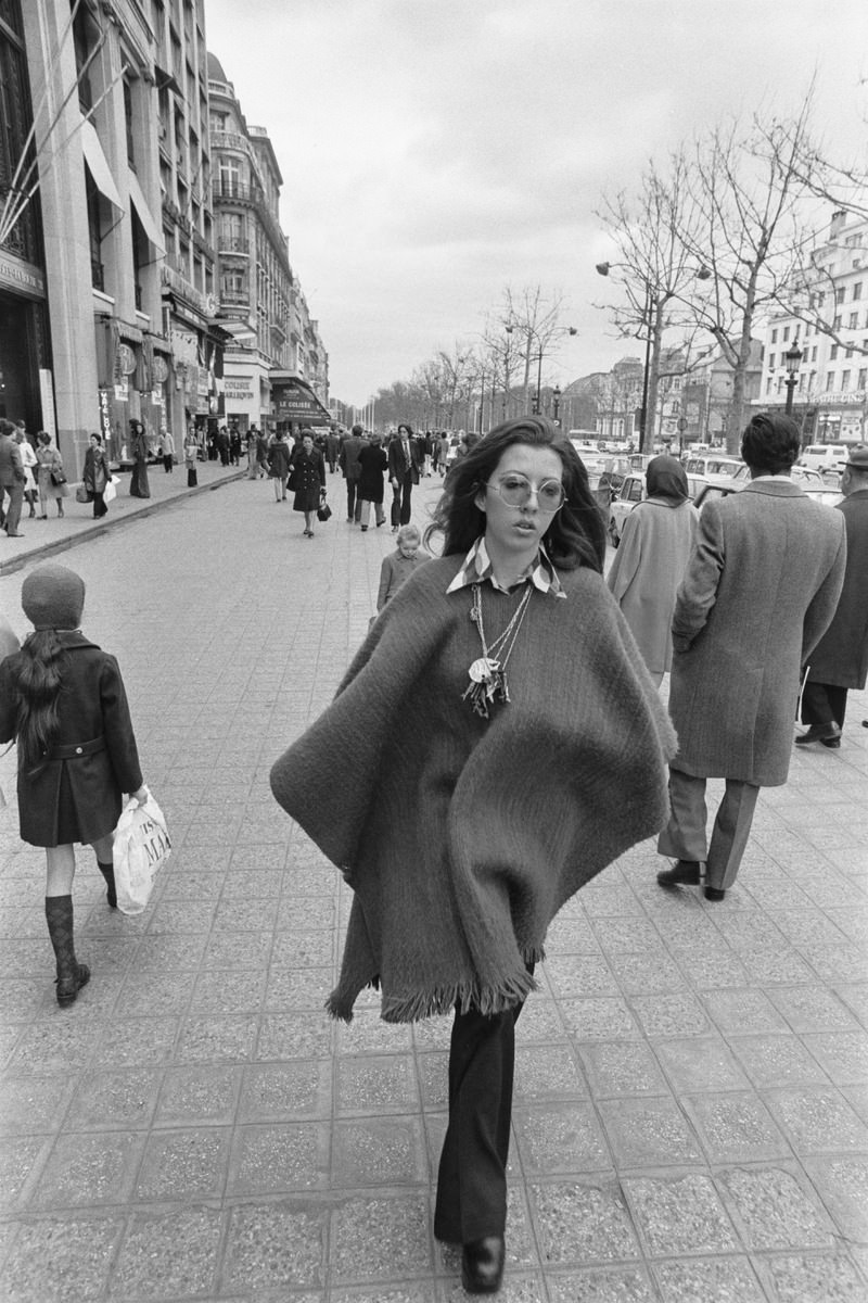 Pedestrians in the streets of Paris, France in 1973